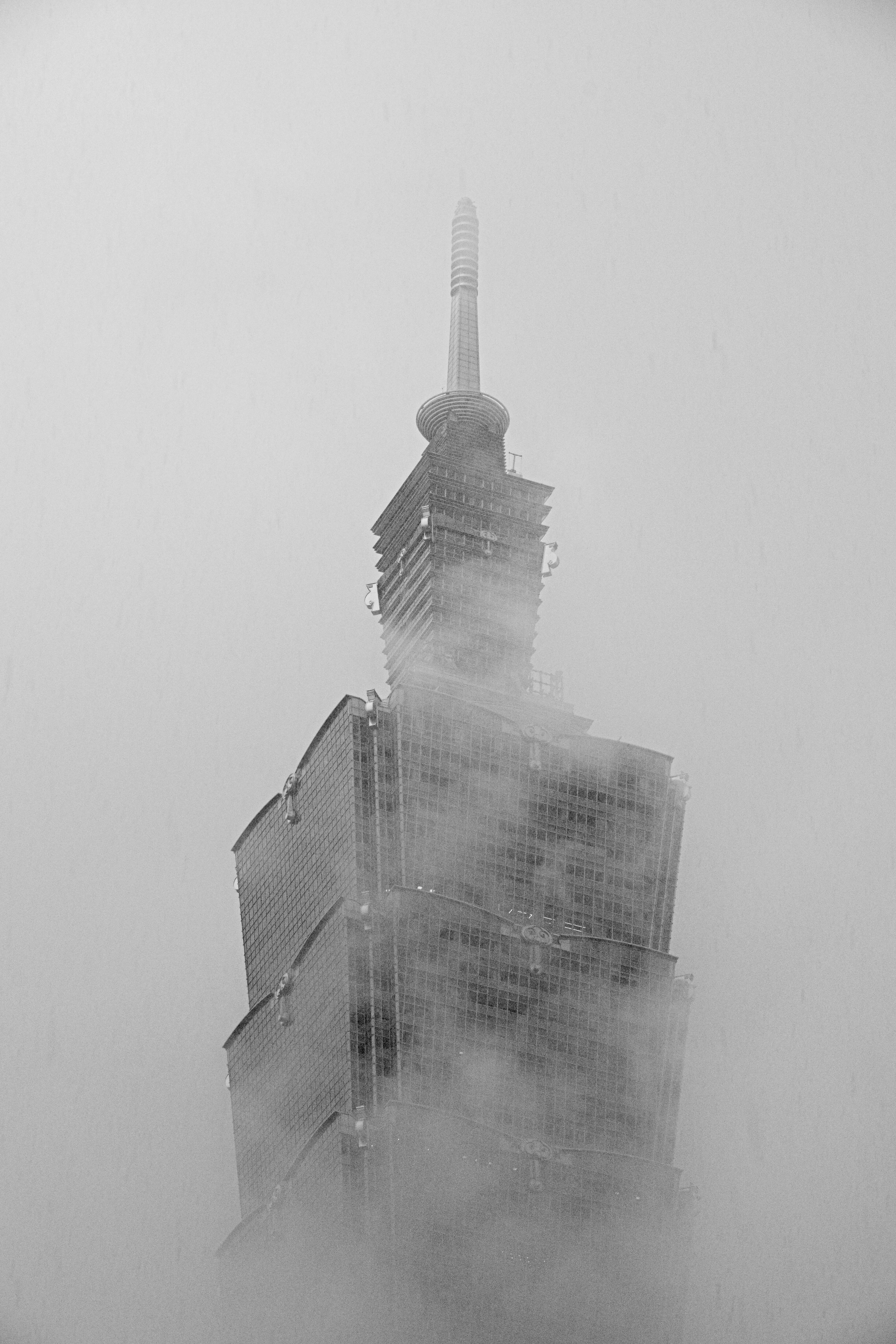 grayscale photo of high rise building